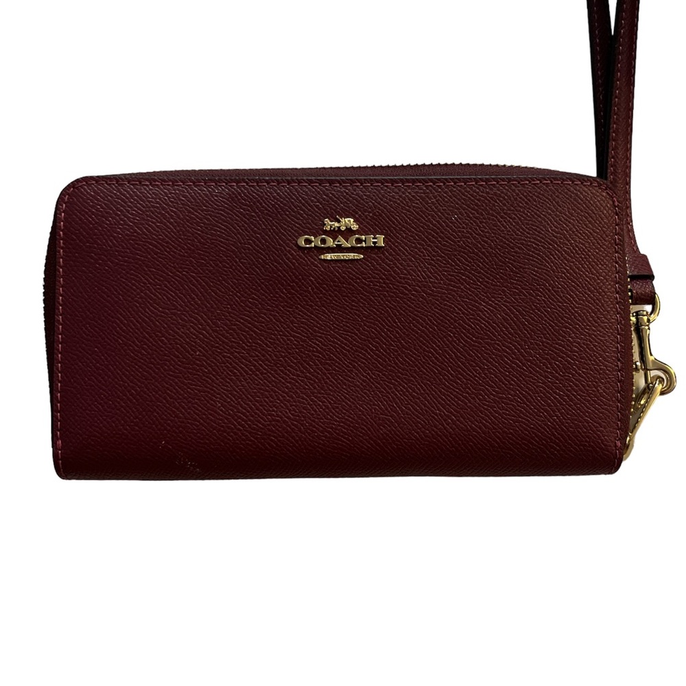 Coach wallet..Deep red…wear as a wristlet for on the go…😍